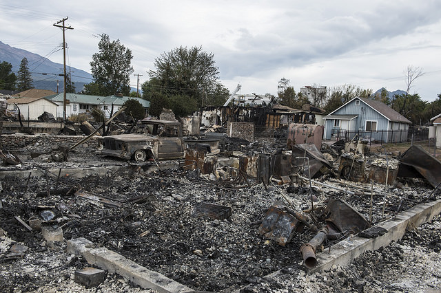 Weed, California. Fire burned 100 homes September 15, 2014 in the Siskiyou County town of Weed. The state, experiencing record drought, declared an emergency in January. Photo by California Emergency Services.