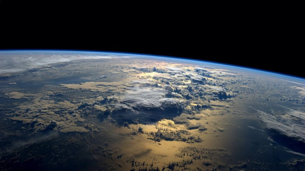 Earth at dawn from the International Space Station. Photo by Reid Wiseman, NASA, public domain