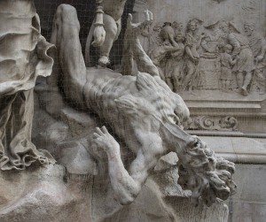 There is no rational reason to fear Ebola in the developed world, writes Ewa Bacon, because we know the source of contagion and have methods to deal with it.  However, panic has set in.  Image: Plague is defeated -- a detail of the "Column of the Plague" (Pestsäule), in Graben, Vienna, Austria. Photo by Jebulon via Wikimedia, Creative Commons