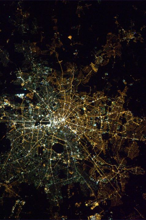 Lighting reveals the lingering divisions between East and West Berlin, with traces of the wall still visible in this 2013 photo from the International Space Station. Photo by Astronaut Col. Chris Hadfield, public domain.