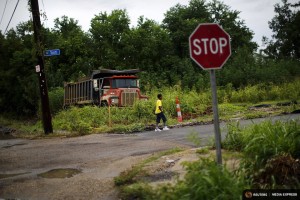 A child walks on a street in the Lower Ninth Ward neighbourhood, an area damaged by Hurricane Katrina, in New Orleans, Louisiana, United States August 18, 2015. In 2005, Hurricane Katrina triggered floods that inundated New Orleans and killed more than 1,500 people as storm waters overwhelmed levees and broke through floodwalls. Congress authorized spending more than $14 billion to beef up the city's flood protection after Katrina and built a series of new barriers that include manmade islands and new wetlands. Reuters photographer Carlos Barria returned to New Orleans after documenting events in 2005 and found a city much rebuilt and renovated, although abandoned homes show Katrina√¢‚Ç¨‚Ñ¢s lingering impact. REUTERS/Carlos Barria