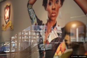 A reflection is seen in the window of a Woodin clothing store at the newly expanded Cap Sud mall in Abidjan, Ivory Coast, September 14, 2015. From Abidjanâ€™s packed airport arrivals hall to the buildings mushrooming across the capital, Ivory Coast is booming, a rare African bright spot as the worldâ€™s biggest cocoa producer bounces back from a 2011 civil war. Buyers of luxury apartments include Ivorians living overseas, while promoters from Morocco, Turkey and China are attracted by tax breaks. Elections - the source of national unrest four years ago - are due in a month but there is no let-up in investment given expectations of an easy victory for incumbent Alassane Ouattara. The government predicts 9.6 percent growth this year, making the former French colony the standout performer on a continent hammered by a slump in commodity prices, capital outflows and tumbling currencies. REUTERS/Joe PenneyPICTURE 22 OF 33 FOR WIDER IMAGE STORY "IVORY COAST IS BOOMING". SEARCH "BOOMING PENNEY" FOR ALL IMAGES