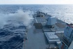 SOUTH CHINA SEA (Jan. 15, 2016) The Arleigh Burke-class guided-missile destroyer USS Curtis Wilbur (DDG 54) conducts a live fire gunnery exercise with its 5-inch .54-caliber gun. Curtis Wilbur is on patrol in the 7th Fleet area of operations in support of security and stability in the Indo-Asia-Pacific. (U.S. Navy photo by Lt.j.g. Jonathan Peterson, Public Domaine