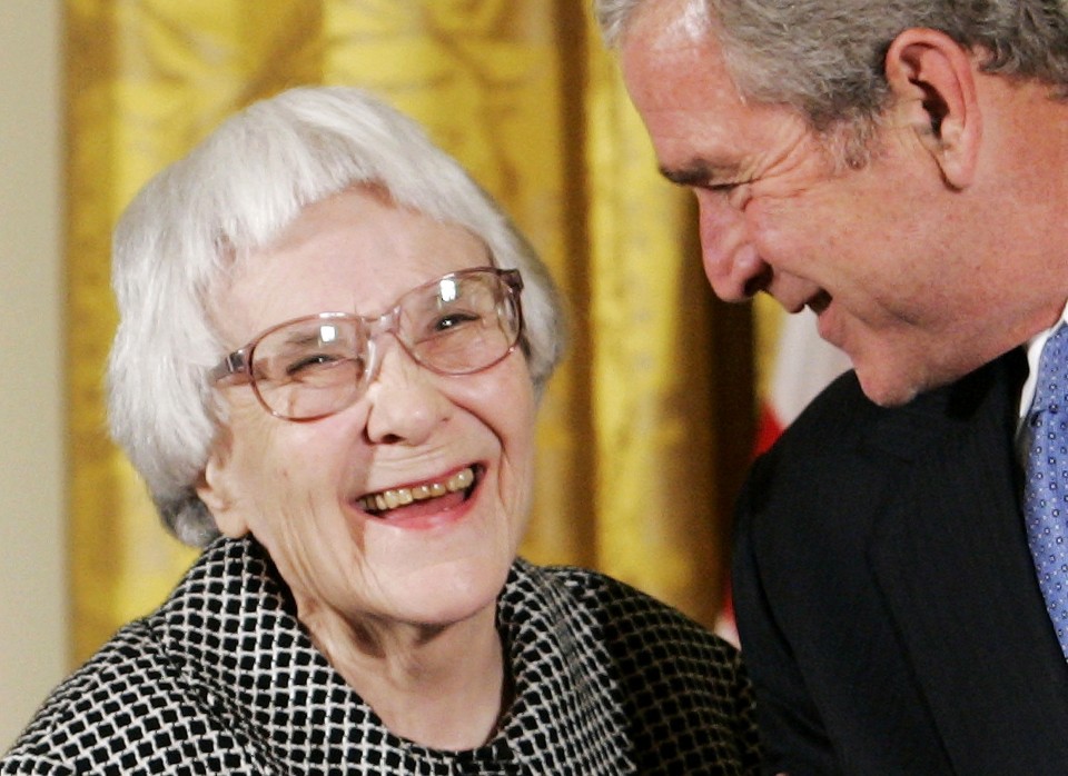 U.S. President George W. Bush (R) before awarding the Presidential Medal of Freedom to American novelist Harper Lee (L) in the East Room of the White House, in this November 5, 2007, file photo. REUTERS/Larry Downing/Files