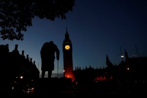 Dawn breaks behind the Houses of Parliament and the statue of Winston Churchill in Westminster, London, Britain June 24, 2016. REUTERS/Stefan Wermuth