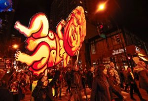 Protesters walk during a protest in Chicago. REUTERS/Kamil Krzacznski